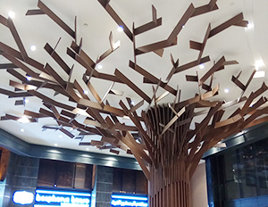 星光汇 - 柱子上用艺术造型铝单板打造的树